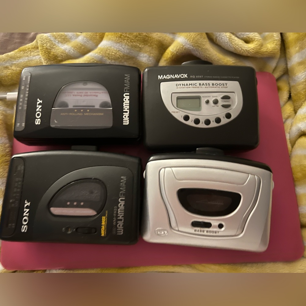 4 Vintage Walkmans radios and cassette players
